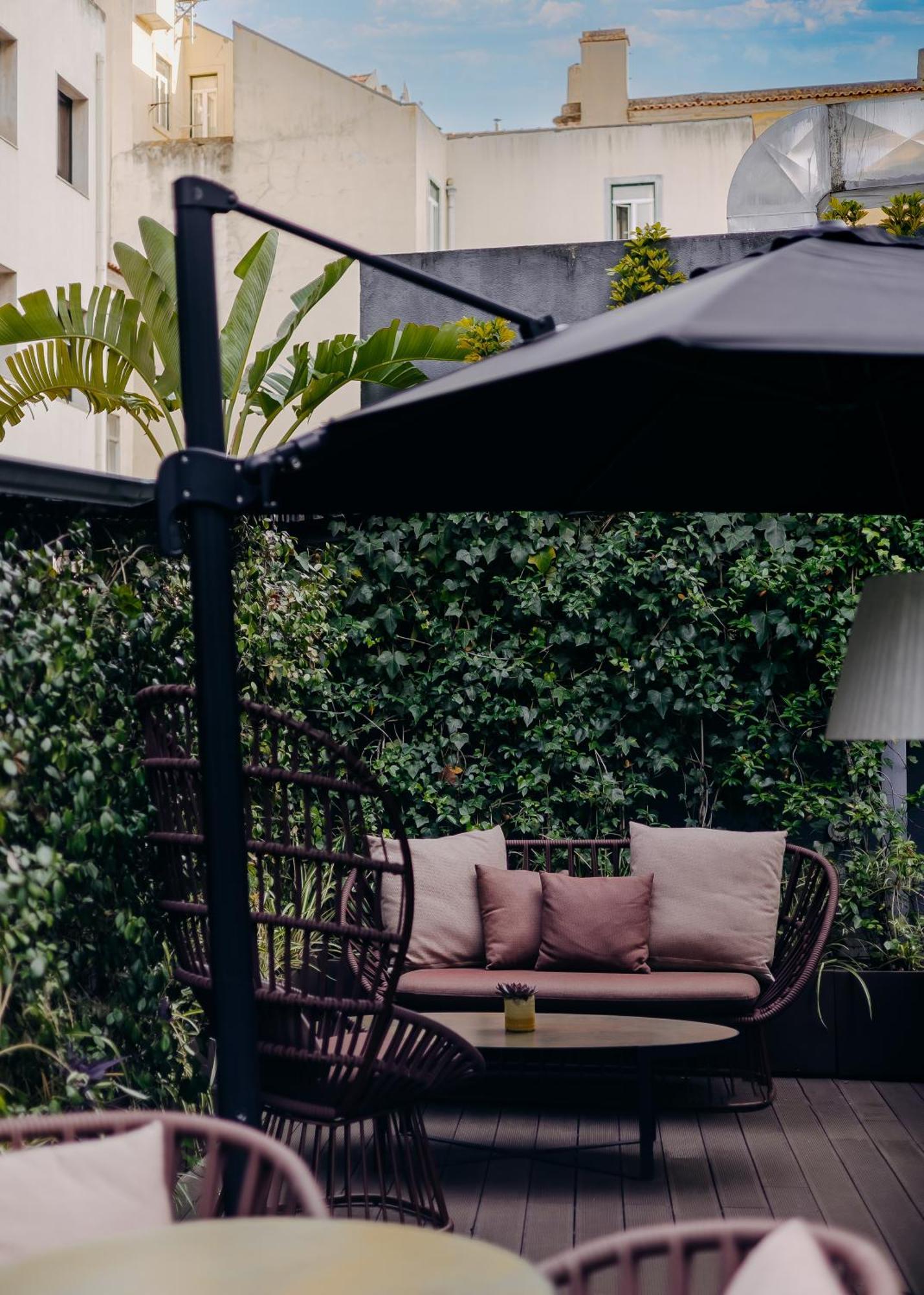 Hotel Fontecruz Lisboa Exterior foto The garden of the hotel